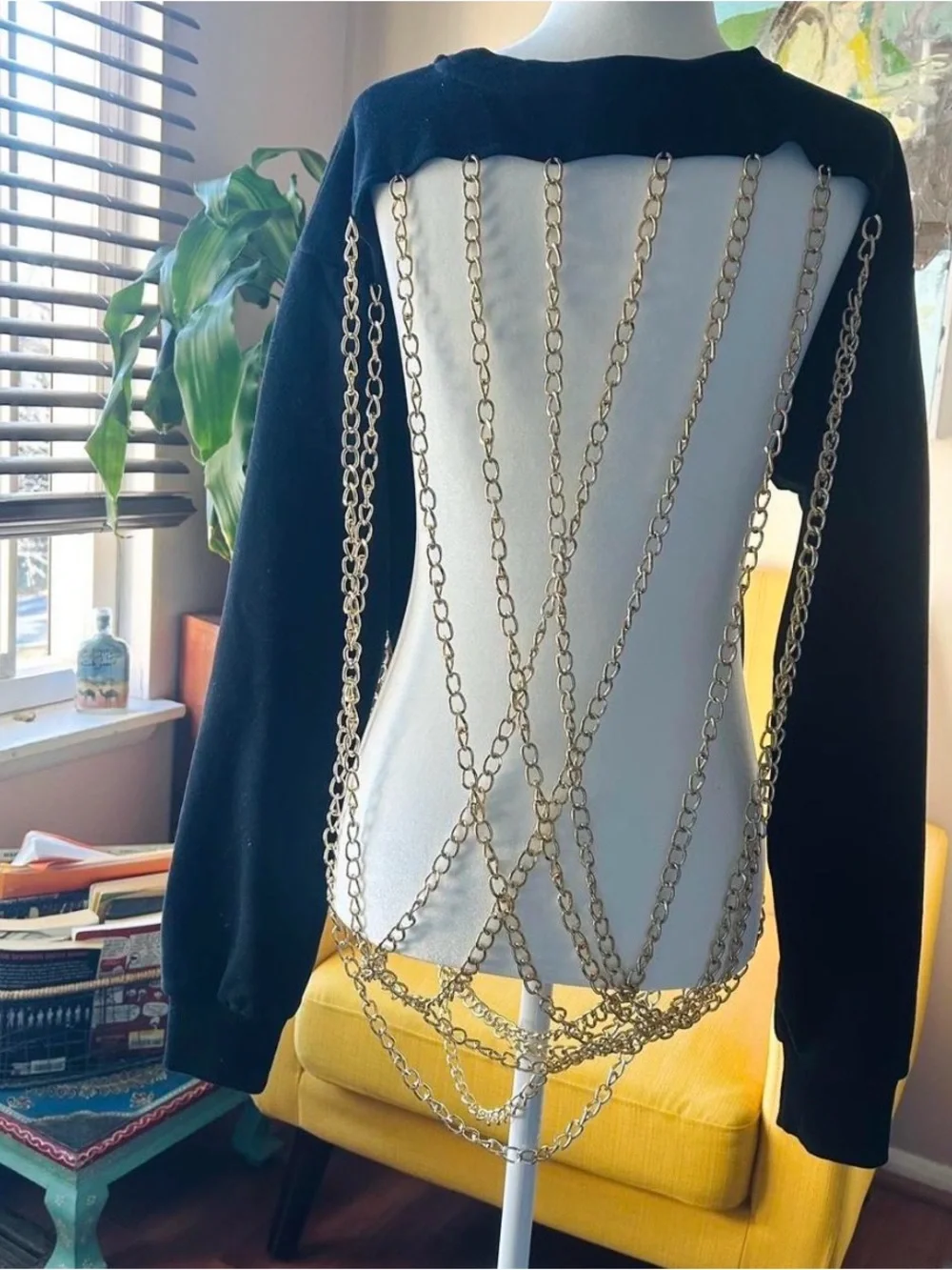 AKIRA Black Crewneck Sweater with Chain Accent